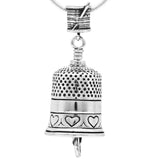 Handcrafted in Sterling Silver, this sterling silver Thimble Bell Pendant is shaped like a thimble, the clapper is a needle and the bail is a spool of thread.