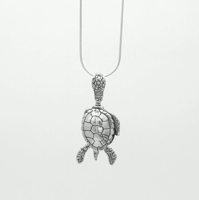 In this video you can see our handcrafted sterling silver Sea Turtle Bell Pendant. 