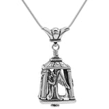 Handcrafted in Sterling Silver, the Angel Bell Pendant is adorned with angels on all four sides, two with their hands clasped in prayer.
