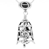 Handcrafted in Sterling Silver, the Music Bell Pendant is designed with staff lines and floating treble clefs, its dancing clapper is an eighth note and the bail is a whole note.