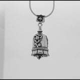 In this video you can see our handcrafted sterling silver Daughter in Law Bell Necklace adorned with flowers around the bell. This gift set shows your daughter in law or future daughter in law she is a welcome and loved part of the family.