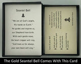 The Gold Seantel Bell Pendant will be carefully packed in a black gift box, with the gift card in the lid. A silver elastic bow closes the box.