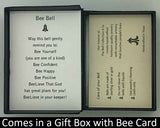The Bee Charm Bell will be carefully packed in a black gift box, with the gift card in the lid. A silver elastic bow closes the box.