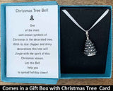 The Christmas Tree Bell charm will be carefully packed in a black gift box, with the gift card in the lid. A silver bow closes the box.