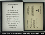 The Peace by Piece Bell Pendant will be carefully packed in a black gift box, with the story card in the lid. A silver elastic bow closes the box.