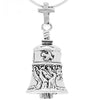 Handcrafted in Sterling Silver, the Prayer Bell Pendant speaks to a deep love of prayer and devotion with the Tree of Life around the base of this bell necklace, and a dove, bible, cross, and flowers around the top.
