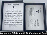 The St. Christopher Bell Pendant will be carefully packed in a black gift box, with the gift card in the lid. A silver elastic bow closes the box.