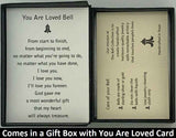 The You Are Loved Bell Necklace Gift Set will be carefully packed in a black gift box, with the story card in the lid. A silver elastic bow closes the box.