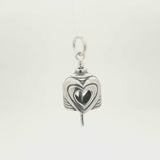 In this video you can see our handcrafted sterling silver Amore Charm Bell from all sides (360 view). 