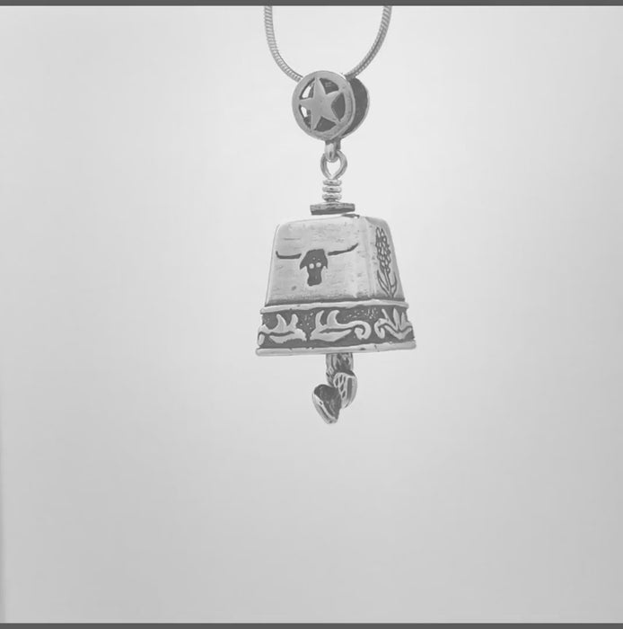 In this video you can see our handcrafted sterling silver Spirit of Texas Bell Pendant from all sides (360 view). 