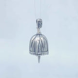 In this video you can see our handcrafted sterling silver DKG McAllen Grapefruit Bell Pendant from all sides (360 view). 