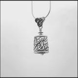 In this video you can see our handcrafted sterling silver Serenity Bell Pendant from all sides (360 view). 