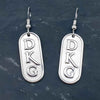 DKG's signature logo is boldly featured on these earrings. Handcrafted with care in sterling silver, this pair of DKG earrings showcase the iconic logo in refined elegance.