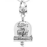 Handcrafted in Sterling Silver, the Sister Bell Pendant has "sisters are forever" inscribed on one side and sisters holding hands on the other side with a purse for a bail and a tube of lipstick for the clapper.