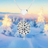 Handcrafted in Sterling Silver, the Snowflake Bell Pendant was inspired by the beauty of snowflakes and features multiple cutouts on each side, forming an intricate snowflake design.