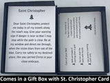 The St. Christopher Charm Bell will be carefully packed in a black gift box, with the gift card in the lid. A silver elastic bow closes the box.