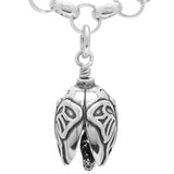 Handcrafted in Sterling Silver, the Butterfly Charm Bell is shaped like a butterfly with a caterpillar for the bell's clapper.