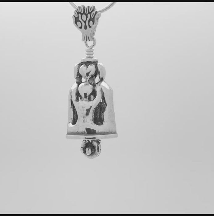In this video you can see our handcrafted sterling silver Family Bell Pendant, Designed to honor the love of family and handcrafted in Sterling Silver, the body of the bell is formed by four figures holding hands under the family tree. The clapper is a child in a tire swing, ringing the bell.