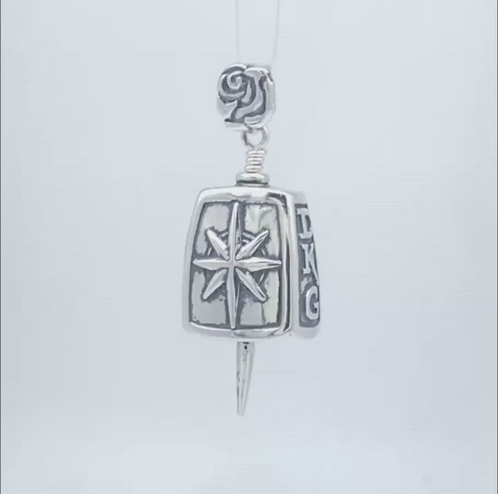 In this video you can see our handcrafted sterling silver Delta Kappa Gamma Journey Bell Pendant. The front and back of the features a compass design with the needle of a compass for the clapper and a DKG rose for the bail. The sides feature the DKG logo.