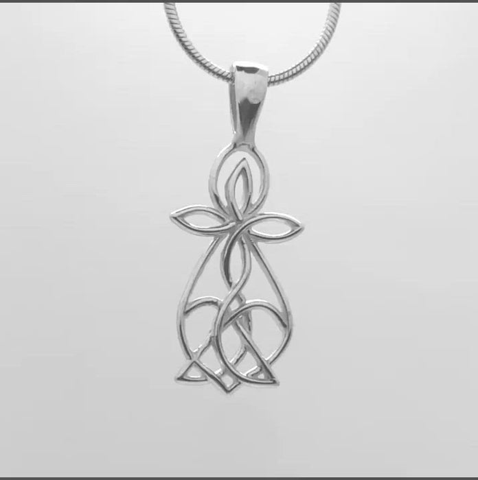 In this video you can see our handcrafted sterling silver Infinite Cross.  Hidden within this cross are many different symbols and meanings. Woven into the cross is a heart, emblematic of His love. A Celtic trefoil knot represents the Holy Trinity. Two infinity symbols form a flower, portraying rebirth and eternal life. There's an Ichthus, representing Christianity and many see an angel as well. How will this cross reveal itself to you?