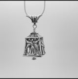 In this video you can see our handcrafted sterling silver pendant. The Angel Bell Pendant is adorned with angels on all four sides, two with open arms and two with their hands clasped in prayer.