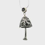 In this video you can see our handcrafted sterling silver Palm Tree Bell Pendant from all sides (360 view). 