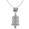 Handcrafted in Sterling Silver, the All Sewn Up Bell Pendant features a quilt pattern wrapped around the bell and a button rim, the bail is a sewing machine, and the clapper is a pair of scissors.