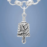 The sterling silver Amazing Grace Bell Charm features a dove on the bell body with the crown of thorns going around the top and the clapper is a Shepherd's hook.