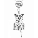 This sterling silver Cat Bell Pendant is unique because the cat's head turns, the only other bell that has this feature is the dog bell. The tail forms the clapper and the bail is a ball of yarn.