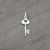 Handcrafted in Sterling Silver, your DKG Key charm has the Texas silhouette cut out in the handle of the skeleton key and "DKG" along the teeth.  