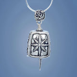 Handcrafted in sterling silver, the front and back of the Delta Kappa Gamma Journey Bell Pendant features a compass design with the needle of a compass for the clapper and a DKG rose for the bail. The sides feature the DKG logo.