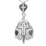 Handcrafted in sterling silver, the God Loves You Bell Necklace has three sides, representing the Holy Trinity and three crosses to represent the three crosses of Calvary. The open hearts remind us of His love. The clapper is a cross with a heart at its center. The bail is a heart with a cross at its center.