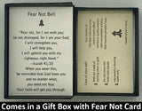 The Isaiah 41:10 Fear Not Charm Bell will be carefully packed in a black gift box, with the story card in the lid. A silver elastic bow closes the box.