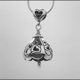 In this video you can see our handcrafted sterling silver You Are Loved Bell Pendant from all sides (360 view). 