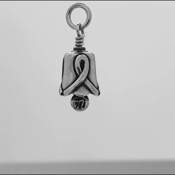 In this video you can see our handcrafted sterling silver Survivor Charm Bell.
