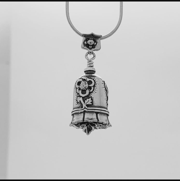 In this video you can see our handcrafted sterling silver Niece Bell Pendant from all sides (360 view). 