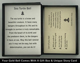 The gold Sea Turtle Bell Pendant will come enclosed in a black gift box with this gift card. Handcrafted in 10 or 14K gold, this bell is shaped like the graceful sea turtle. The bail is the turtle's head and it's hind legs and tail form the clapper.