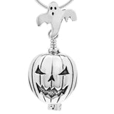 Handcrafted in Sterling Silver, the sterling silver Jack O'Lantern Bell Pendant is shaped like the traditional carved pumpkin with a ghost for the bail and a tea candle for the clapper.