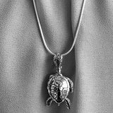 Handcrafted in sterling silver, this bell is in the shape of a turtle’s shell, the head is the bail, and it’s hind legs and tail make up the clapper. A unique gift for anyone who loves the sea or sea turtles. 