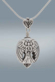 Handcrafted in Sterling Silver, this sterling silver Bell Necklace has a Guardian Angel with her wings spread on both sides of the bell. Both the bail and clapper are formed from a pair of angel wings in the shape of a heart.